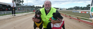 Peter Riley with celebrity greyhound Fred Bassett & VBISRace 8 VBIS distance series winner Which Wabbit Peter Riley with celebrity greyhound Fred Bassett & VBISRace 8 VBIS distance series winner Which Wabbit
